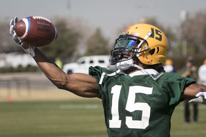 Rashad Ross catches a pass during a Hotshots practice on the Great Lawn practice field outside of State Farm Stadium.
