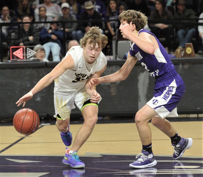 Jayton's Tye Scogin, left, tries to get around Irion County's Kaden Councilman. Jayton beat the Hornets 47-32 in the Region II-1A championship game Saturday, March 2, 2019, at Abilene Christian's Moody Coliseum.