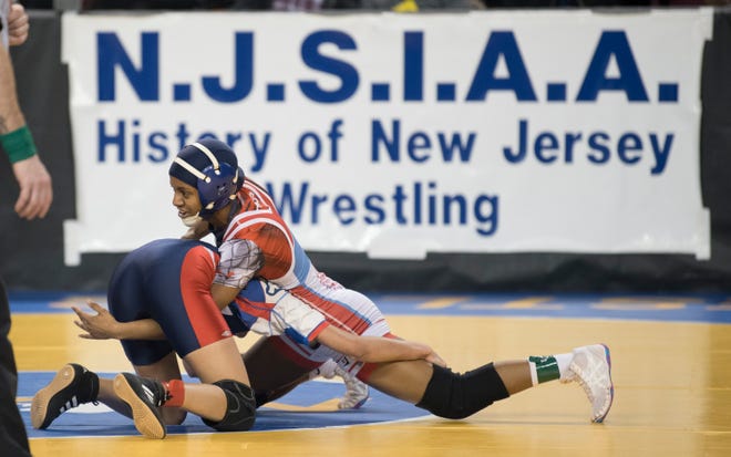 2019 Njsiaa State Wrestling Championships Day 2 2
Pennsauken's Anmarie Lebron, top, controls Breanna Cervantes of Seacaucus during an 100 lb., opening round bout of the 2019 NJSIAA Girls State Wrestling Championships tournament held at Boardwalk Hall in Atlantic City on Friday, March 1, 2019. Lebron won by pin.