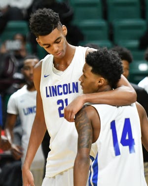Emoni Bates, Jalen Fisher and Ypsilanti Lincoln defeated Saline in a Division 1 district final on Friday night.