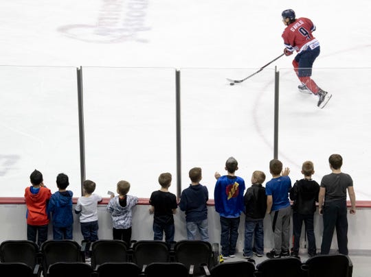 Evansville Thunderbolt Nick D'Avolio brings the puck up the ice in front of some of his young fans during a game earlier this season at the Ford Center.