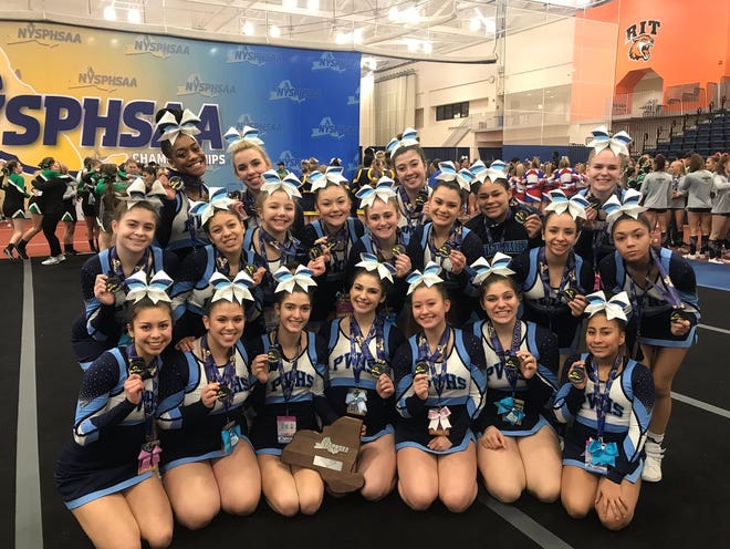 Putnam Valley's cheerleading team poses after coming in 2nd place in the small school-large team division at the state cheerleading championships at the Rochester Institute of Technology on Saturday.
