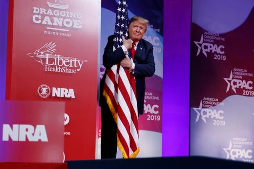 Image result for trump hugging flag