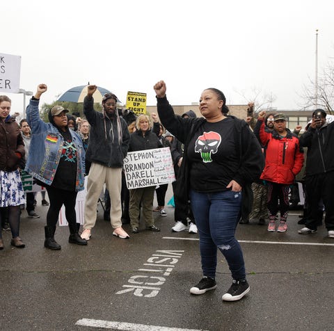 Tanya Faison, of Black Lives Matter, addresses a...