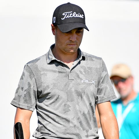 Justin Thomas walks up to the 10th tee during the...