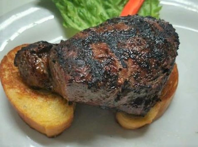 The Open Face Ribeye from Rusty Duck in Dexter - a 10-ounce ribeye served on garlic toast.