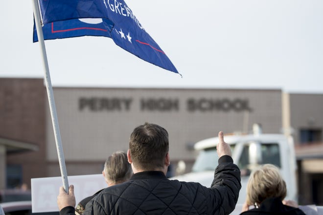 Protesters gather across from Perry High School on Queen Creek Road on March 4, 2019.