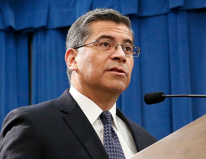 In this Feb. 15, 2019 file photo, California Attorney General Xavier Becerra speaks at a news conference in Sacramento, Calif. Becerra and other Democratic lawmakers are seeking to overturn new obstacles the Trump administration set up for women seeking abortions, including barring taxpayer-funded family planning clinics from making abortion referrals.
