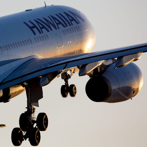 A Hawaiian Air Airbus A330 takes off for Honolulu...
