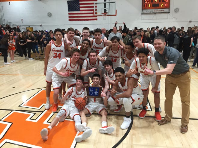 The Cherokee High School boys' basketball team celebrates its first South Jersey Group 4 title in nine years after a 55-40 win over visiting Millville.