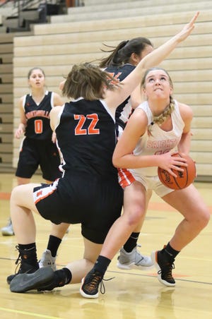 Brighton's Sydney Hetherton scored a game-high 12 points in a 59-19 district basketball victory over Pinckney.