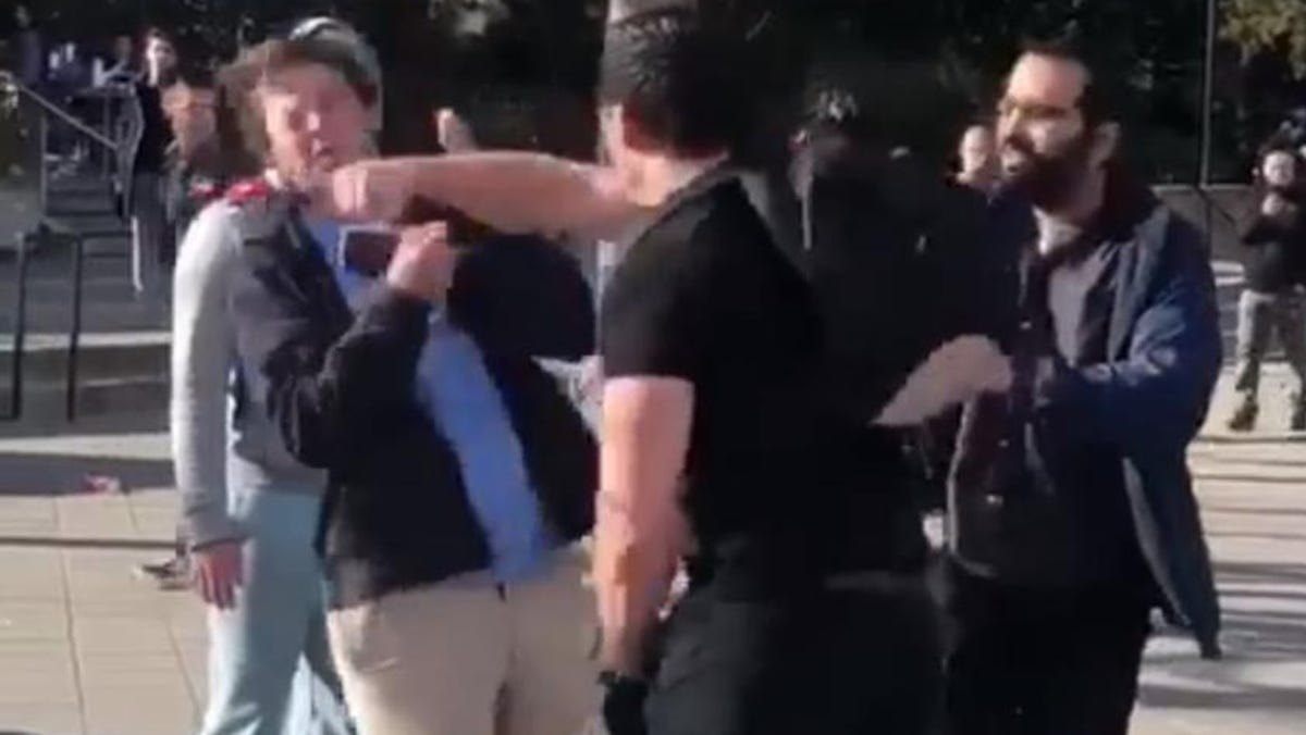 A man promoting conservative views was punched on the campus of the University of California, Berkeley, in February 2019. Screenshot from YouTube.