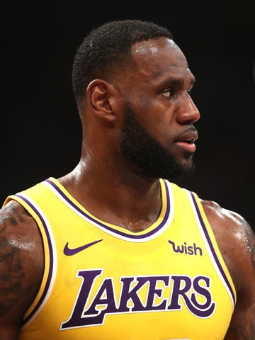 LeBron James looks on during the first half of the Lakers' loss to the Clippers.