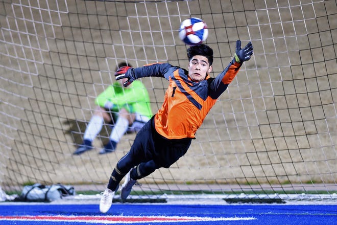 Abilene High's Bryan Bocanegra (1) attempts to save a penalty kick against Euless Trinity at Shotwell Stadium on Tuesday, March 5, 2019. Bocanegra saved a PK and scored from the spot as the Eagles came back to tie the game 2-2 in regulation and won 5-4 in penalty kicks.