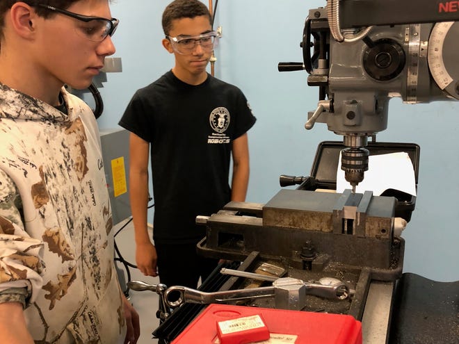 Somerset County Vocational & Technical High School students Nick Corra and Marc Acevedo work in the College’s Advanced Manufacturing lab.