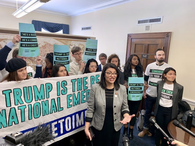 U.S. Rep. Rashida Tlaib, D-Detroit, and impeachment activists speak to the press in her office on Capitol Hill.