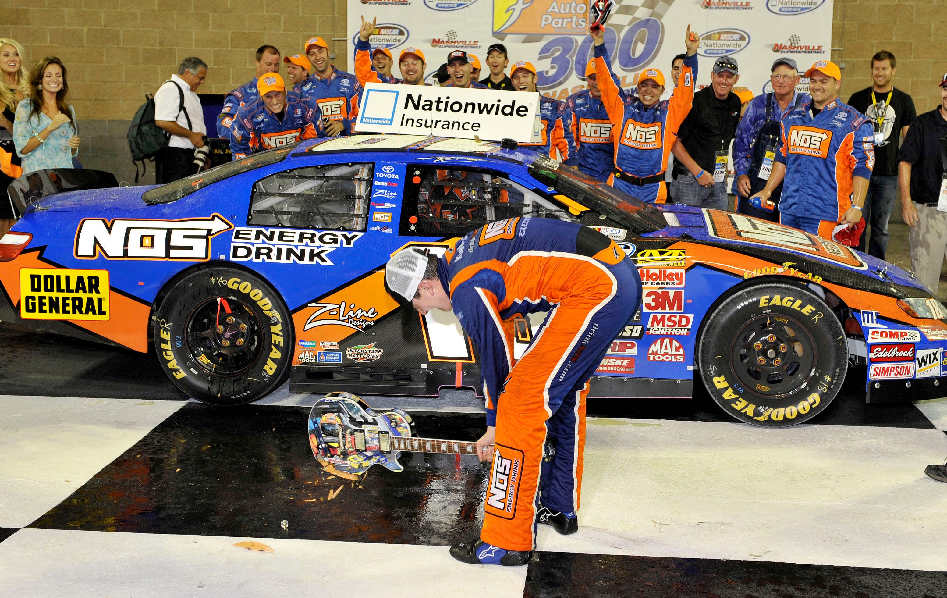 Why did Kyle Busch smash Les Paul guitar at Nashville Superspeedway?