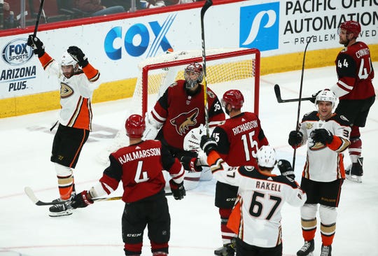Anaheim Ducks center Adam Henrique (14) reacts after scoring a goal against Arizona Coyotes goaltender Darcy Kuemper (35) in the third period on Mar. 5, 2019, at Gila River Arena in Glendale, Ariz.
