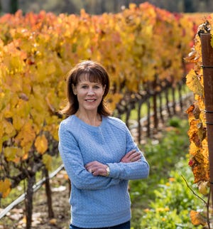 Rhonda Carano of Reno, owner and CEO of Ferrari-Carano Vineyards and Winery, one of Sonoma County’s leading houses, takes a moment in a vineyard at the home estate.