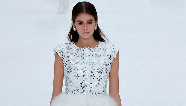 US model Kaia Gerber presents a creation by...