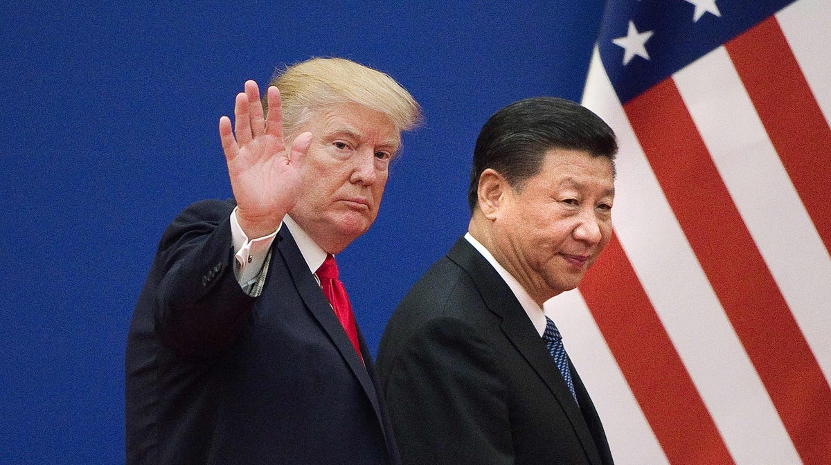 (FILES) This file picture taken on November 9, 2017 shows US President Donald Trump (L) and China's President Xi Jinping leaving a business leaders event at the Great Hall of the People in Beijing. - US President Donald Trump on March 1, 2019, urged China to abolish tariffs on agricultural products imported from the United States -- adding that trade talks between the rival powers were going well. "I have asked China to immediately remove all Tariffs on   our agricultural products (including beef, pork, etc.)," the president wrote on Twitter. (Photo by Nicolas ASFOURI / AFP)NICOLAS ASFOURI/AFP/Getty Images ORIG FILE ID: AFP_1E382Y