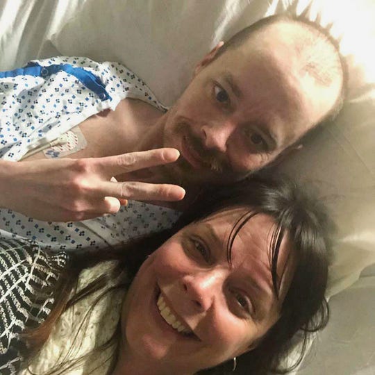 In this Feb. 26, 2019, selfie provided by Bridgette Hoskie, her brother Jay Barrett and herself pose for the photo inside an ICU at Yale New Haven Hospital in New Haven, Conn. () ORG XMIT: RPRK201