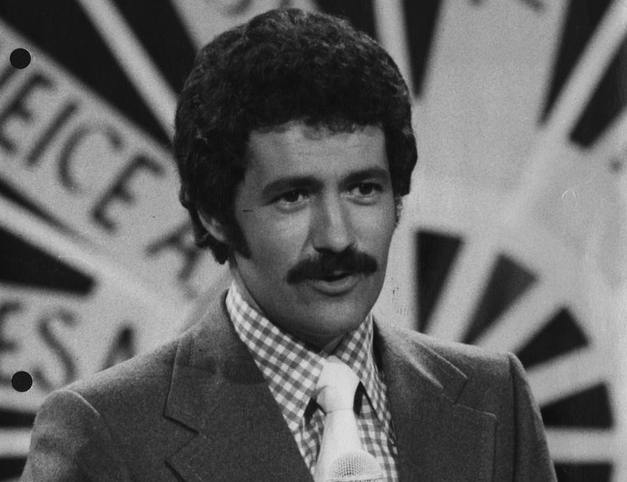 Alex Trebek in 1973, hosting "Wizard of Odds" for NBC. He has hosted "Jeopardy!" since its premier in 1984.  