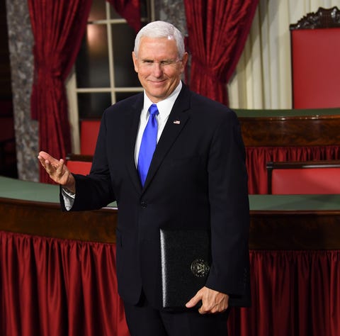 Vice President Mike Pence winks as he officiates...