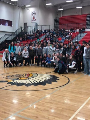 The Columbia Falls girls' basketball team stopped in Browning during a pep rally before this week's State A tourney in Great Falls to make amends for an ugly incident during the divisional tournament.