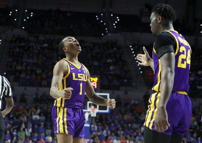 Mar 6, 2019; Gainesville, FL, USA;LSU Tigers guard Javonte Smart (1) celebrates with forward Emmitt Williams (24) against the Florida Gators  during the first half at Exactech Arena. Mandatory Credit: Kim Klement-USA TODAY Sports