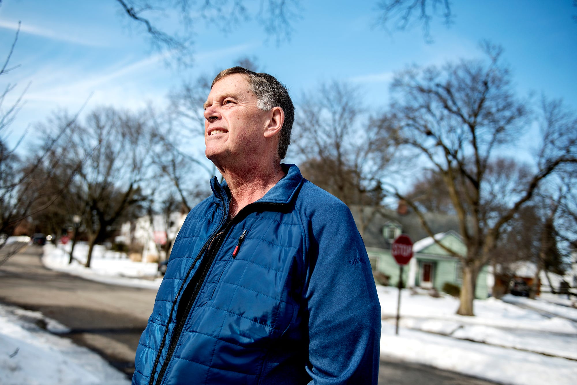 Dale Downes, 61, of East Lansing has lived at his two-story home at 660 Snyder St. since the early 90s. He and his wife raised three children there. Downes is photographed outside his home on Thursday, Feb. 21, 2019, in East Lansing.