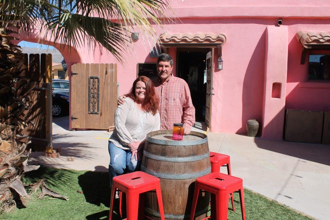 In this file photo, Tamara and Tyler Stucky stand in the beer and wine garden at Tall Pines Beer and Wine on White Sands Boulevard.