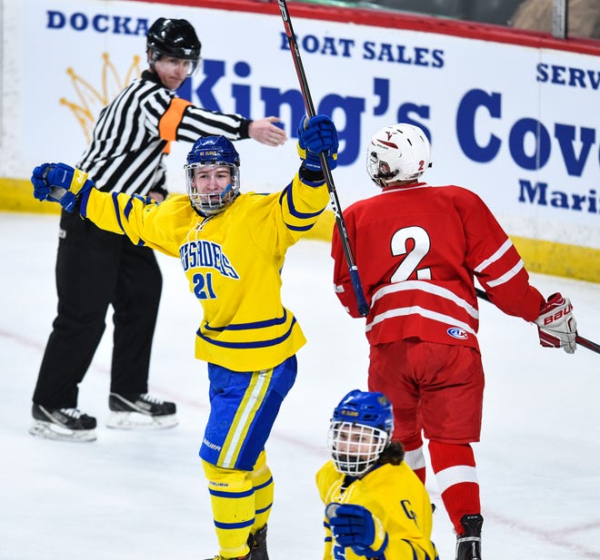 Cathedral’s Luke Schmidt celebrates one of his two goals during the Minnesota Boy's Hockey Tournament Class A quarterfinals Wednesday, March 6, at the Xcel Energy Center in St. Paul. 