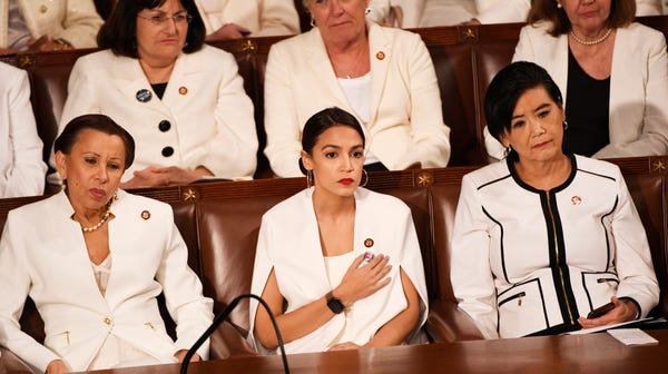 Rep. Alexandria Ocasio-Cortez (D-N.Y.) and other...