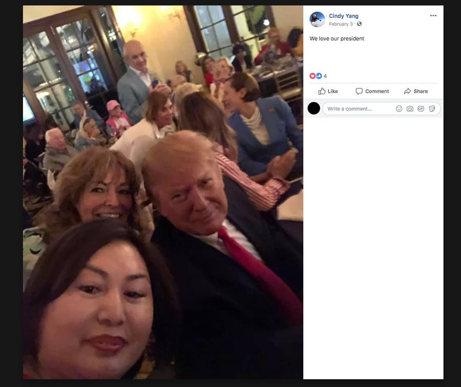 This is a frame grab for the Facebook page if Li Yang, 45, showing a selfie she snapped  with Trump from the Super Bowl watch party, held at the president's West Palm Beach country club, the Miami Herald reported Friday.