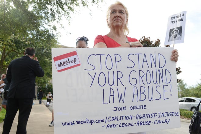 Cathy Makowski demonstrated against what she calls the abuse of Florida's Stand Your Ground law in front of the Seminole County Courthouse in Sanford, Fla., after the shooting death of teenager Trayvon Martin in 2012.