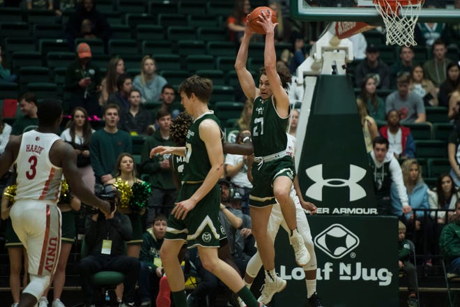 Colorado State University sophomore forward Logan Ryan (21) snags a pass from University of Nevada Las Vegas players on Saturday, March 9, 2019, at Moby Arena in Fort Collins, Colo. Ryan has said he's transferring from CSU.
