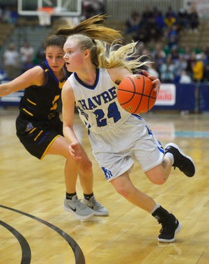 Havre's Sadie Filius heads for the basket in Friday's semifinal game against Laurel at the State Class A Basketball Tournament in the Four Seasons Arena.