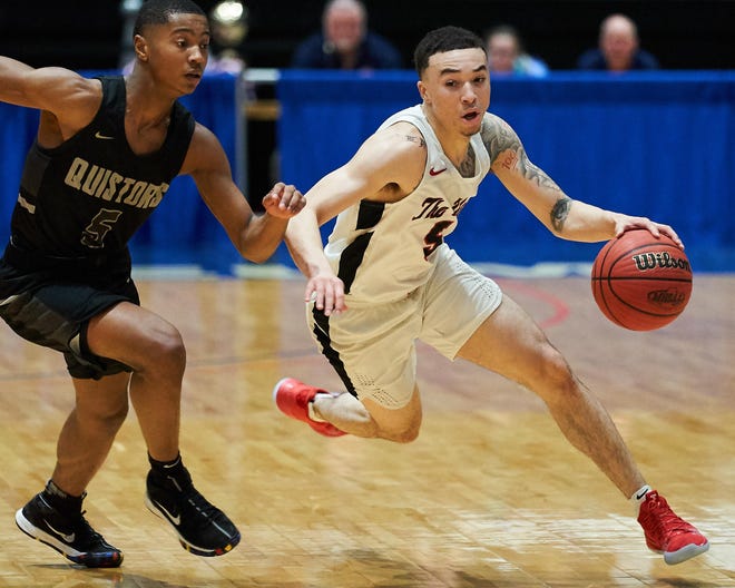 Calvin Temple (5), pictured in this file photo from the MHSAA 5A Boys Basketball Championship Finals in March 2019, has announced his decision to transfer to UL.