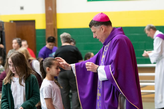 Bishop James F. Checchio celebrated an Ash Wednesday Mass at St. Joseph School in Carteret on Wednesday, March 6.