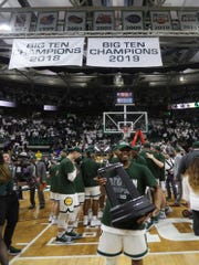 Michigan State guard Cassius Winston holds the Big Ten trophy Saturday, March 9, 2019 at the Breslin Center in East Lansing, Mich.