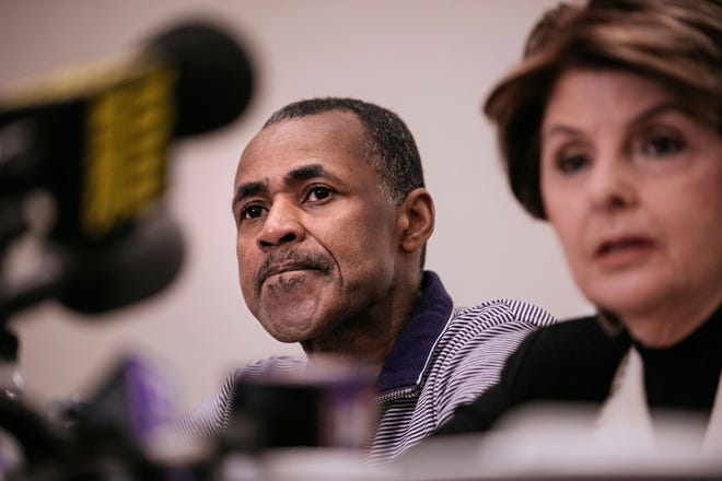 Gloria Allred, seated with Gary Dennis of Pennsylvania, takes questions during a press conference announcing a video tape said to present further evidence of wrongdoing by recording artist R. Kelly Sunday, March 10, 2019, in New York. Allred said the tape, found in Dennis's home, shows R. Kelly sexually abusing more than one underage girl. (AP Photo/Kevin Hagen)
