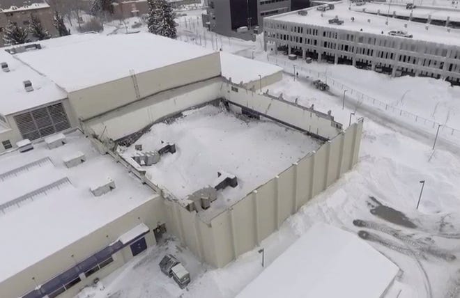 In this Thursday, March 7, image taken from video provided by Montana State University News Service, is part of the roof at a Montana State University fitness center in Bozeman, that has collapsed. The student fitness center's South Gym roof collapsed early Thursday morning. Since then, the North Gym's roof collapsed.