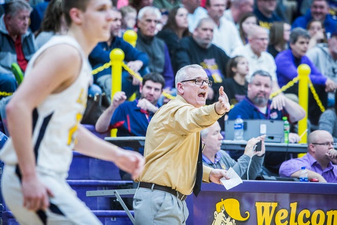 Delta coach Mark Detweiler, shown here during the regional game against Marion, led the Eagles to the only perfect regular season in the state.