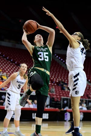 Colorado State's Lore Devos goes for a shot during the Rams' 62-59 loss to Utah State in the first round of the Mountain West tournament on Sunday in Las Vegas.