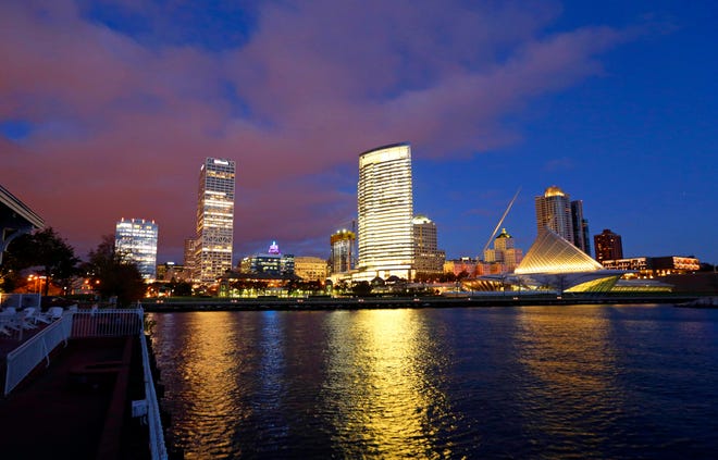 In this Oct. 31, 2017 photo, the downtown skyline over looks Lake Michigan in Milwaukee. The Democratic National Committee has selected Milwaukee to host the 2020 national convention.