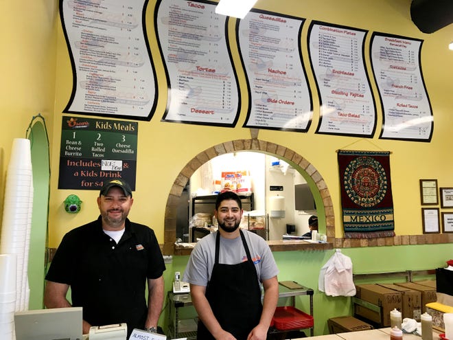 Javier Ruiz Jr. and his son Luis own and operate the Oscar's Taco Shop in Cool Springs.