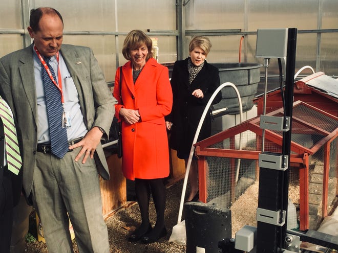 State Senator Jay Hottinger, First Lady Fran DeWine and Ohio Department of Agriculture Director Dorothy Pelanda are given a look at a Granville Schools' "farmbot" that can plant seeds and be directed via smart phone.