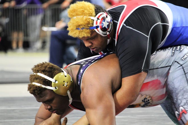 Wakulla's Darius Wilkins wrestles at the FHSAA Wrestling State Championships inside Silver Spur Arena in Kissimmee.