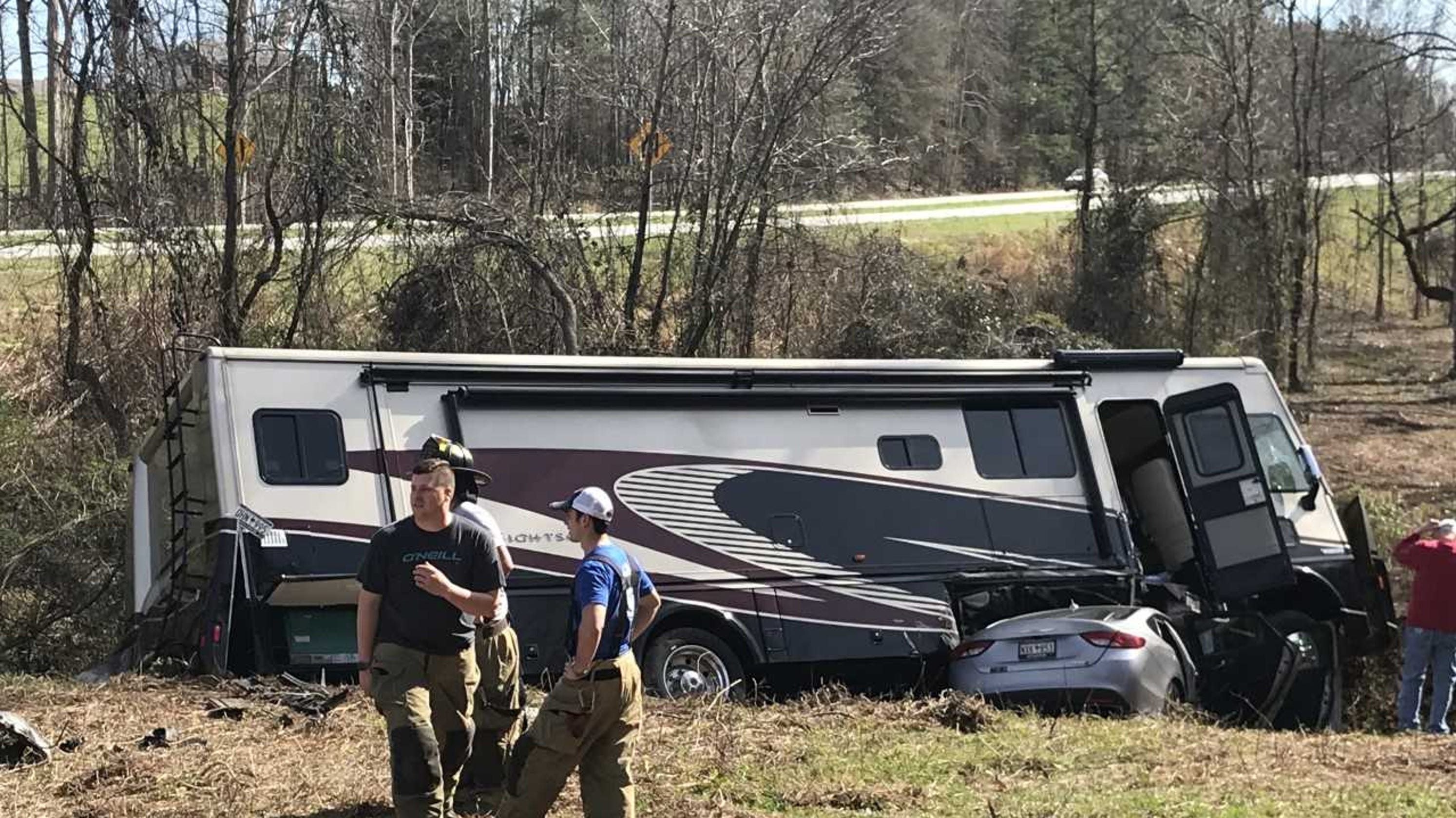 RV lands on top of car; drivers survive crash